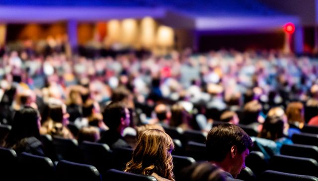 Audience of a conference in an auditorium